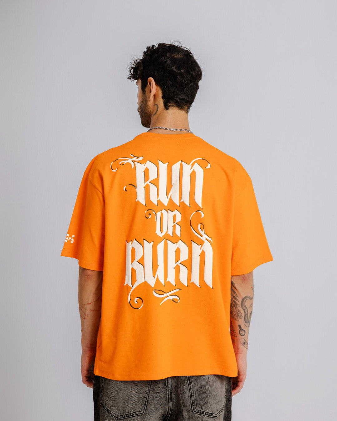 Run or Burn - Orange - Evrhood oversized graphic t-shirt