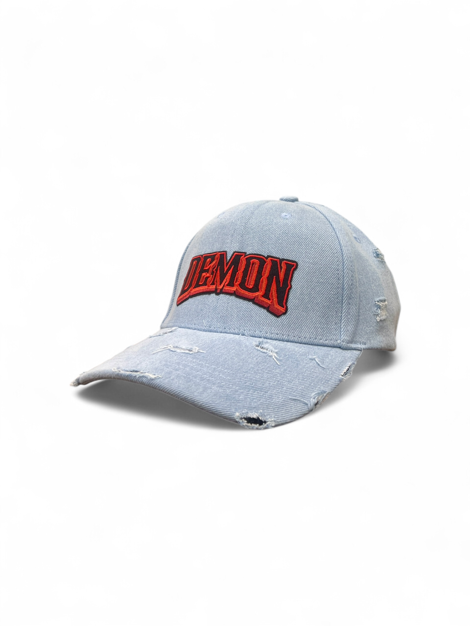 Distressed denim cap with red 'DEMON' embroidery on a white background